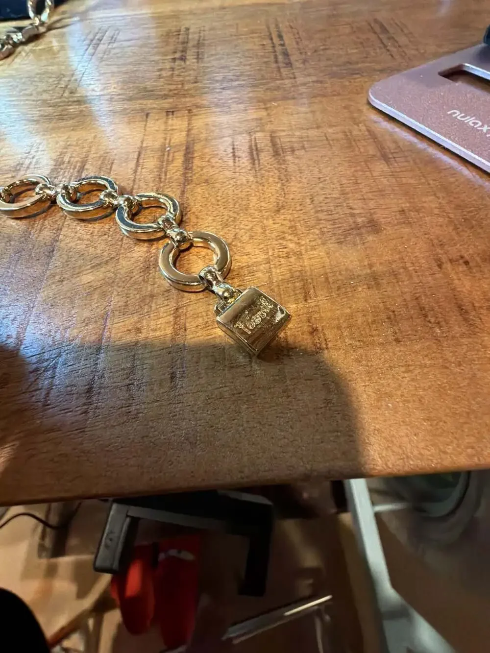 Fossil Gold Tone Link Chain Belt with Padlock Charm